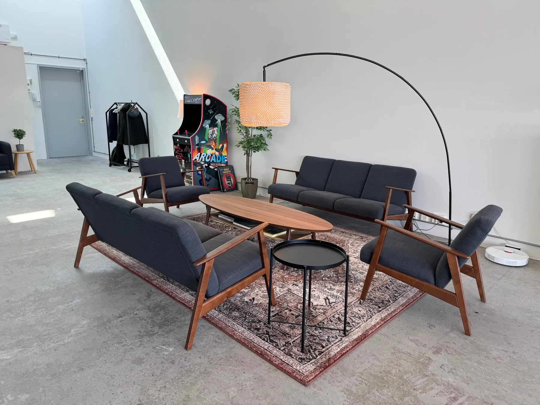 Lounge &mdash; Unplanned meetings, reading, and the arcade machine.